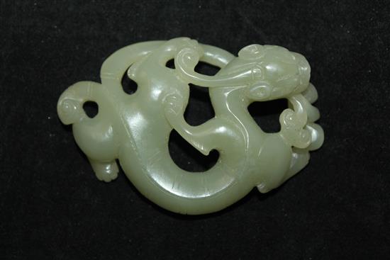 A Chinese celadon jade carving of a chi-dragon biting a sprig of lingzhi fungus, Qing dynasty, 6.9cm